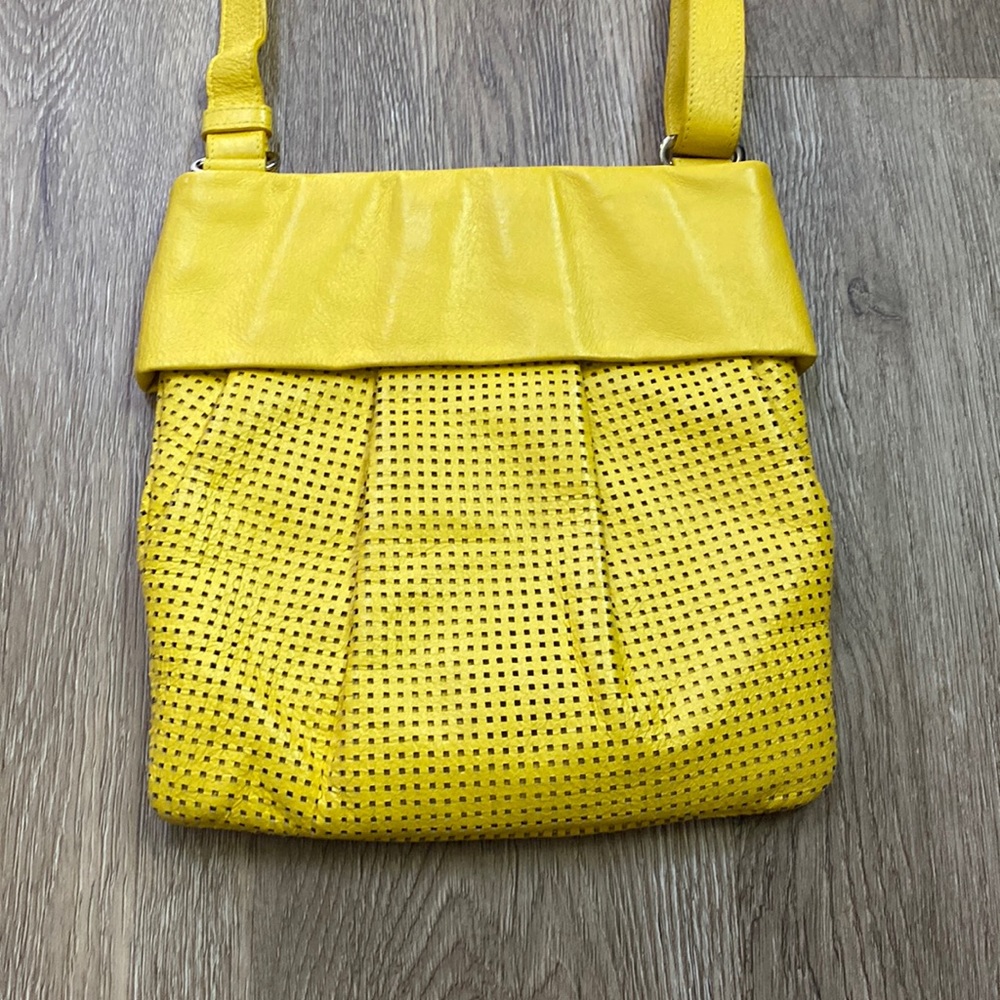 Vintage Beckon yellow crossbody purse.